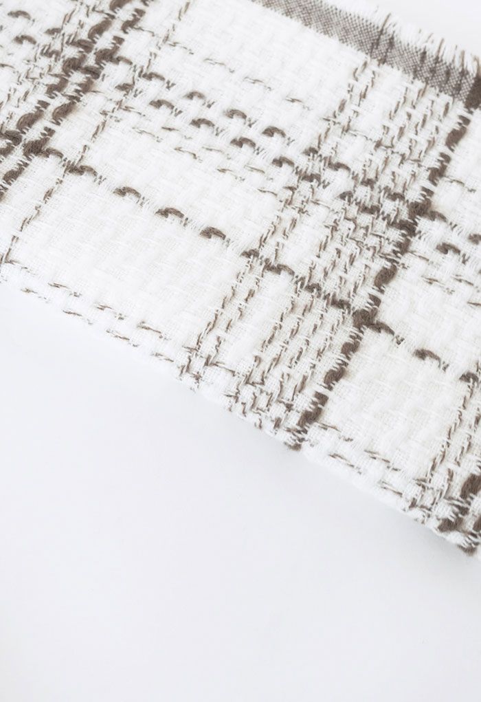 Bufanda con flecos y estampado de cuadros en marfil
