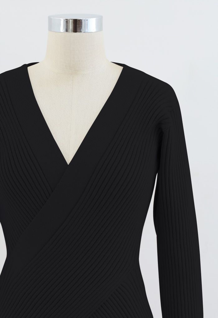 Conjunto de suéter y pantalón largo de punto acanalado cruzado en negro