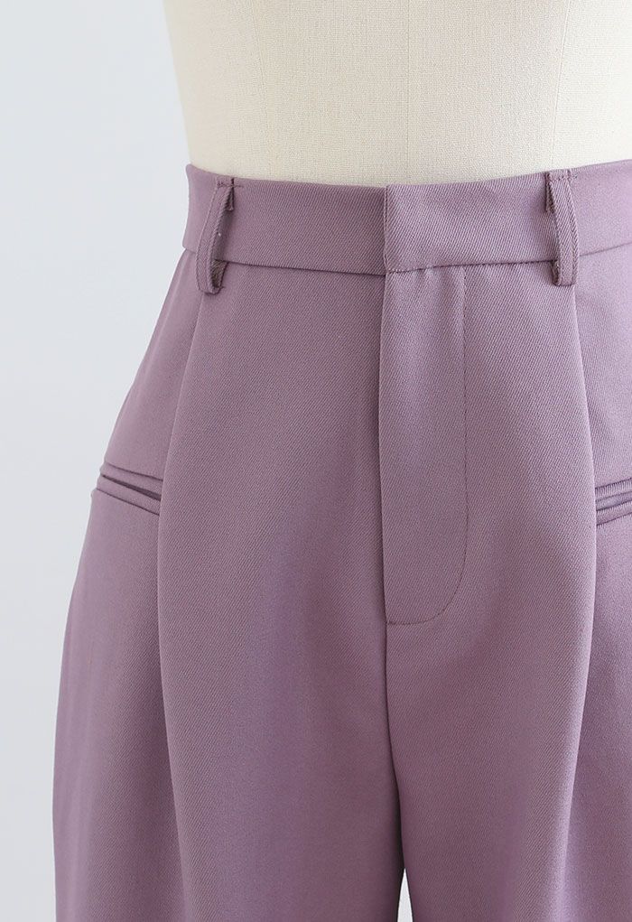 Pantalones rectos con bolsillo delantero en lila