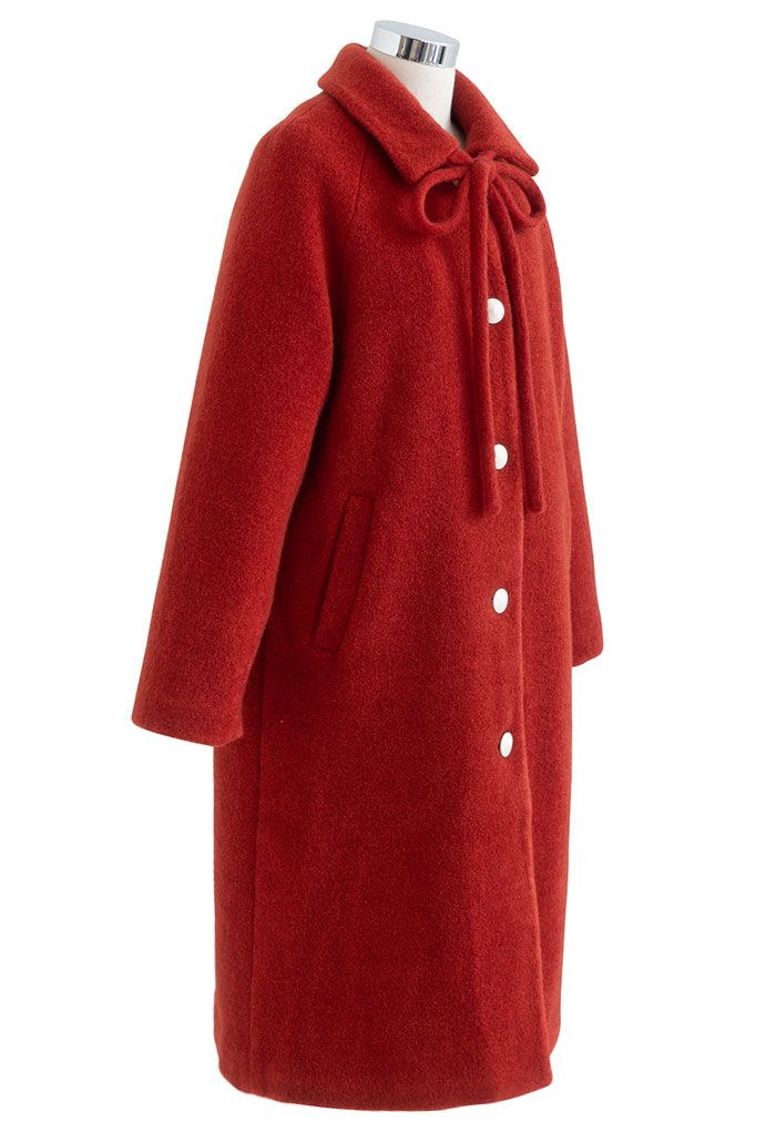 Abrigo largo con botones y lazo de lazo en rojo