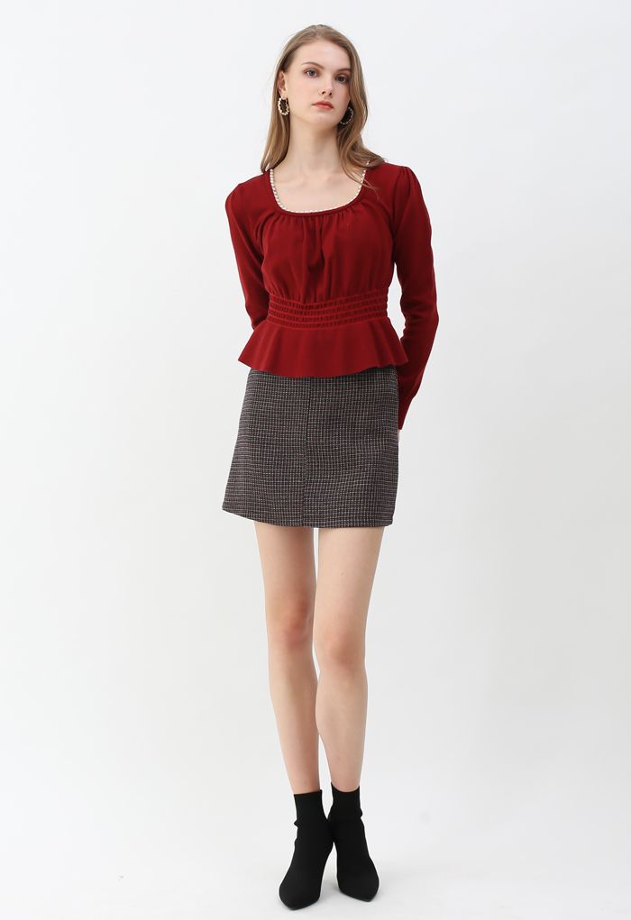 Minifalda de tiro alto en mezcla de lana texturizada en vino
