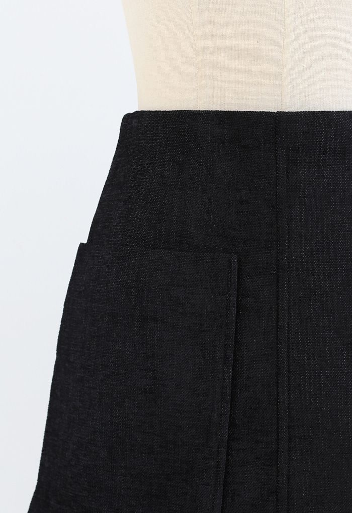 Minifalda de tweed brillante con bolsillo de parche en negro
