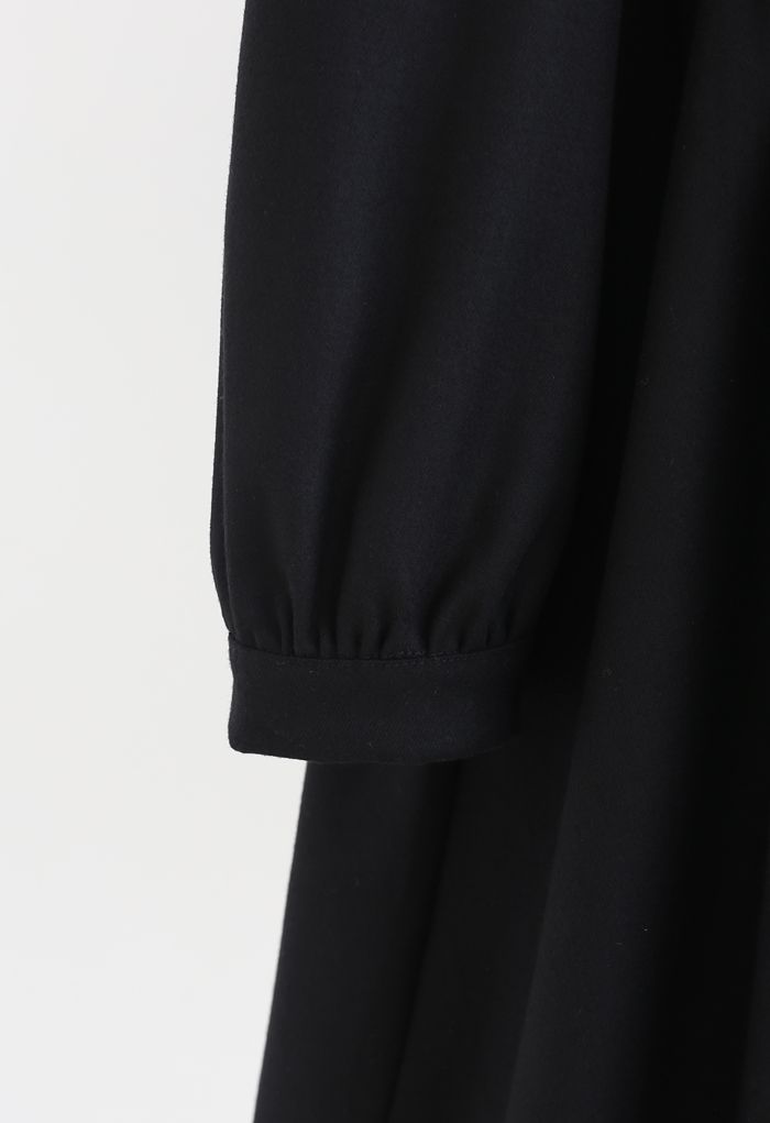 Vestido de abrigo con botones y cuello desmontable en negro