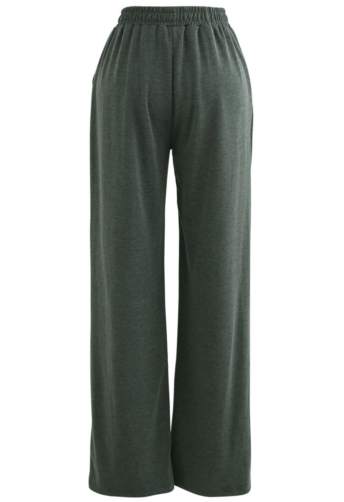 Pantalones anchos con bolsillos holgados verde oliva