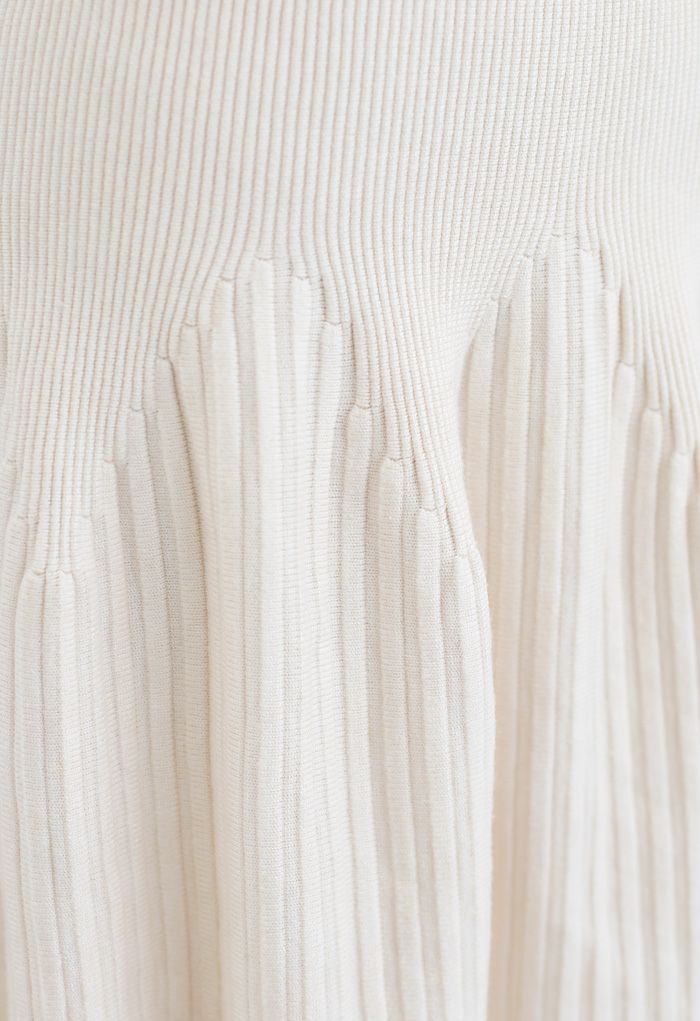 Falda midi de punto Radiant Lines en color crema
