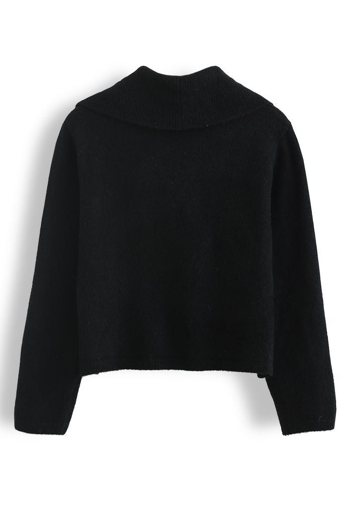 Suéter de punto con hombros descubiertos y cuello en negro