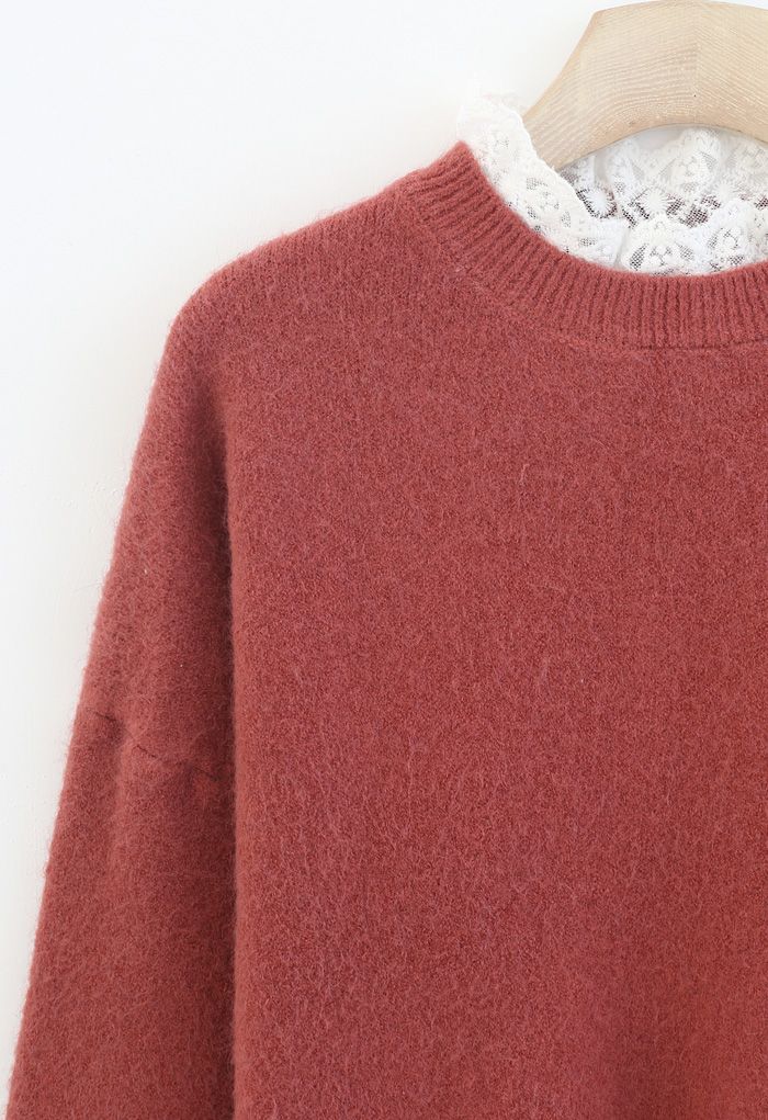 Suéter de punto difuso con detalles de encaje en rojo