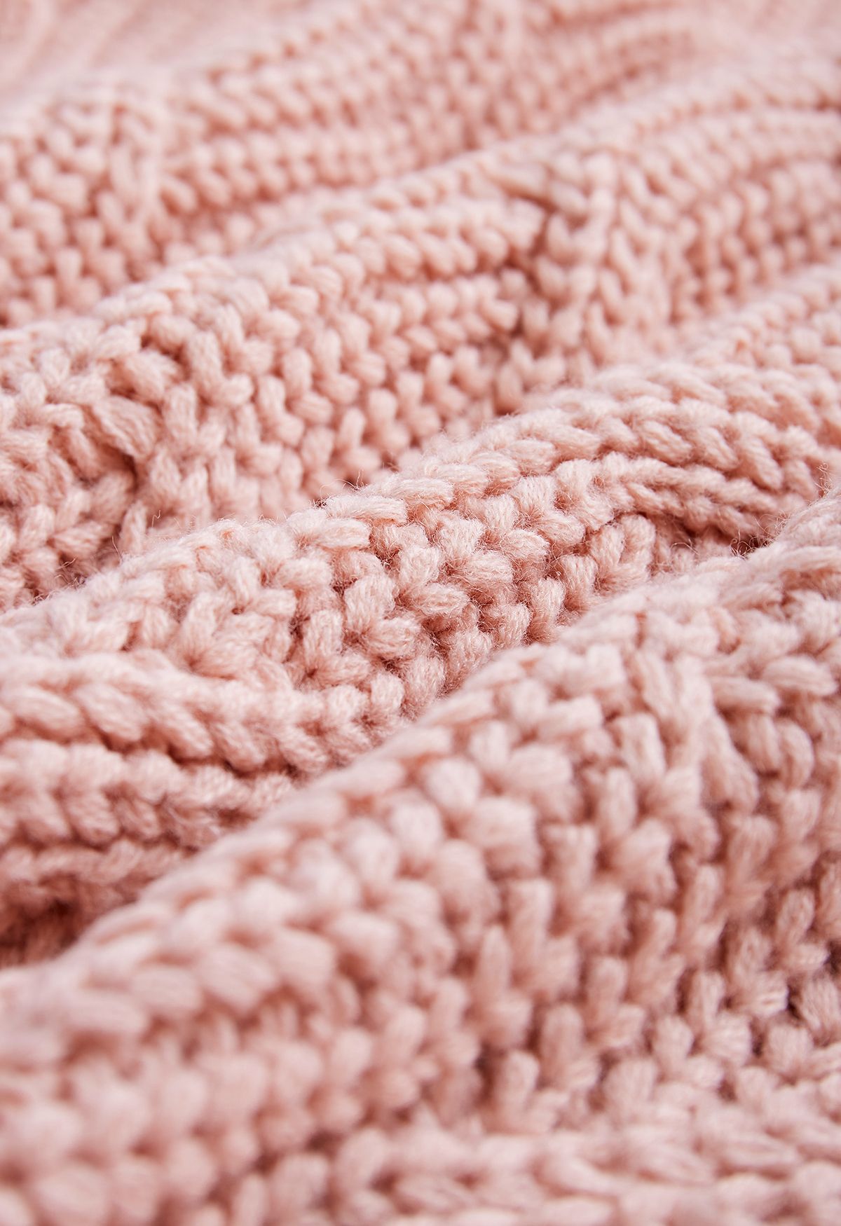 Suéter de punto grueso trenzado Hi-Lo de cuello alto en rosa