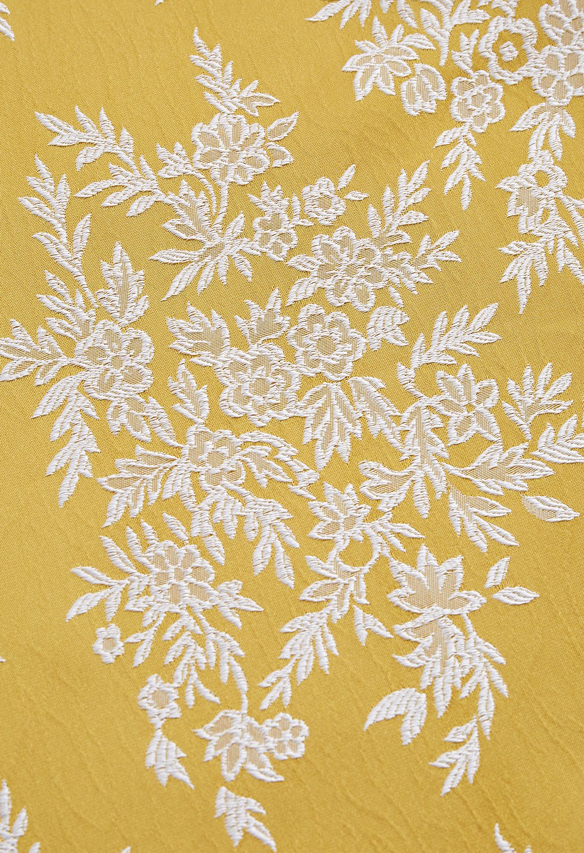 Falda midi con bordado en relieve de jacquard botánico en mostaza