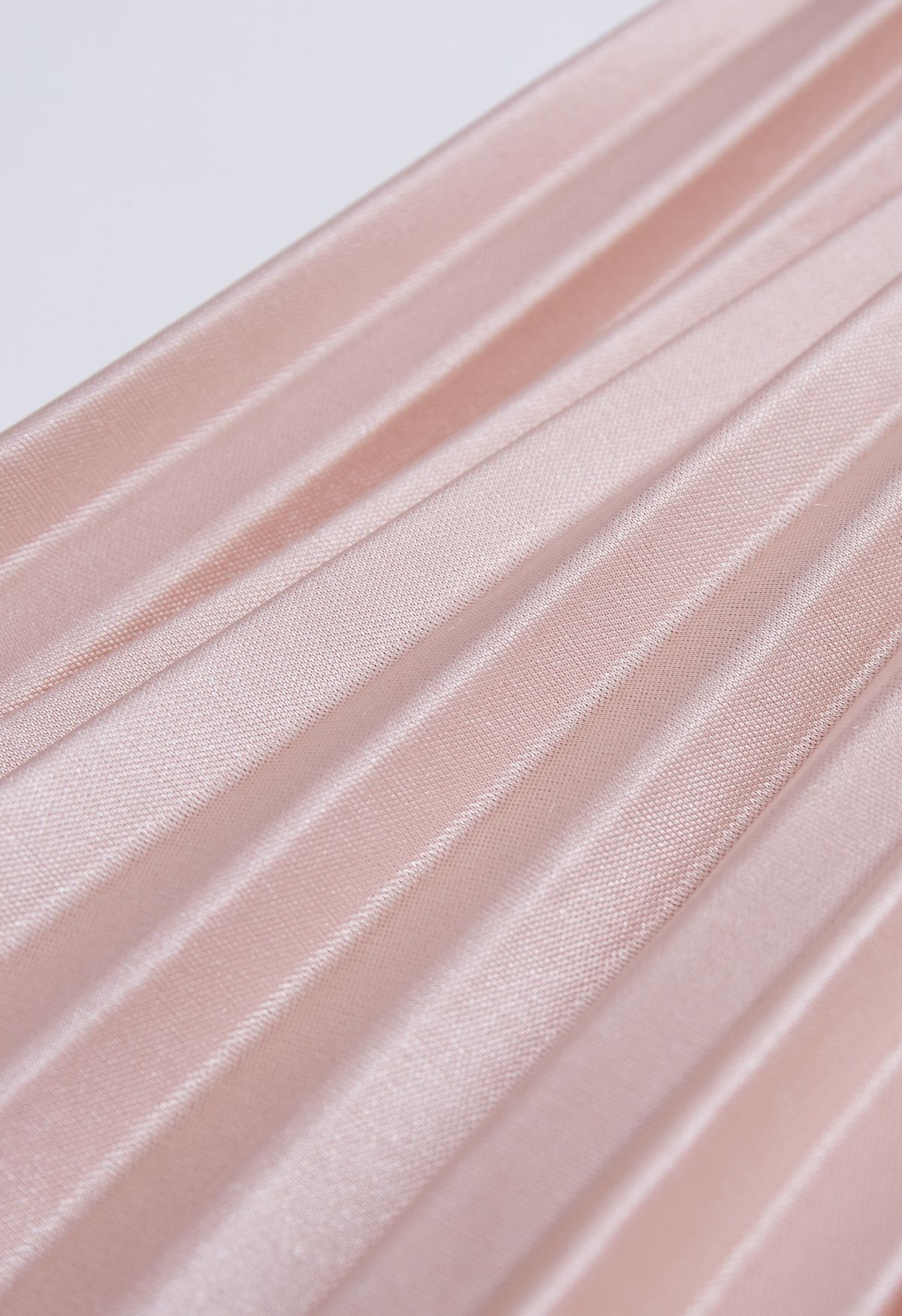 Falda larga plisada brillante en rosa nude