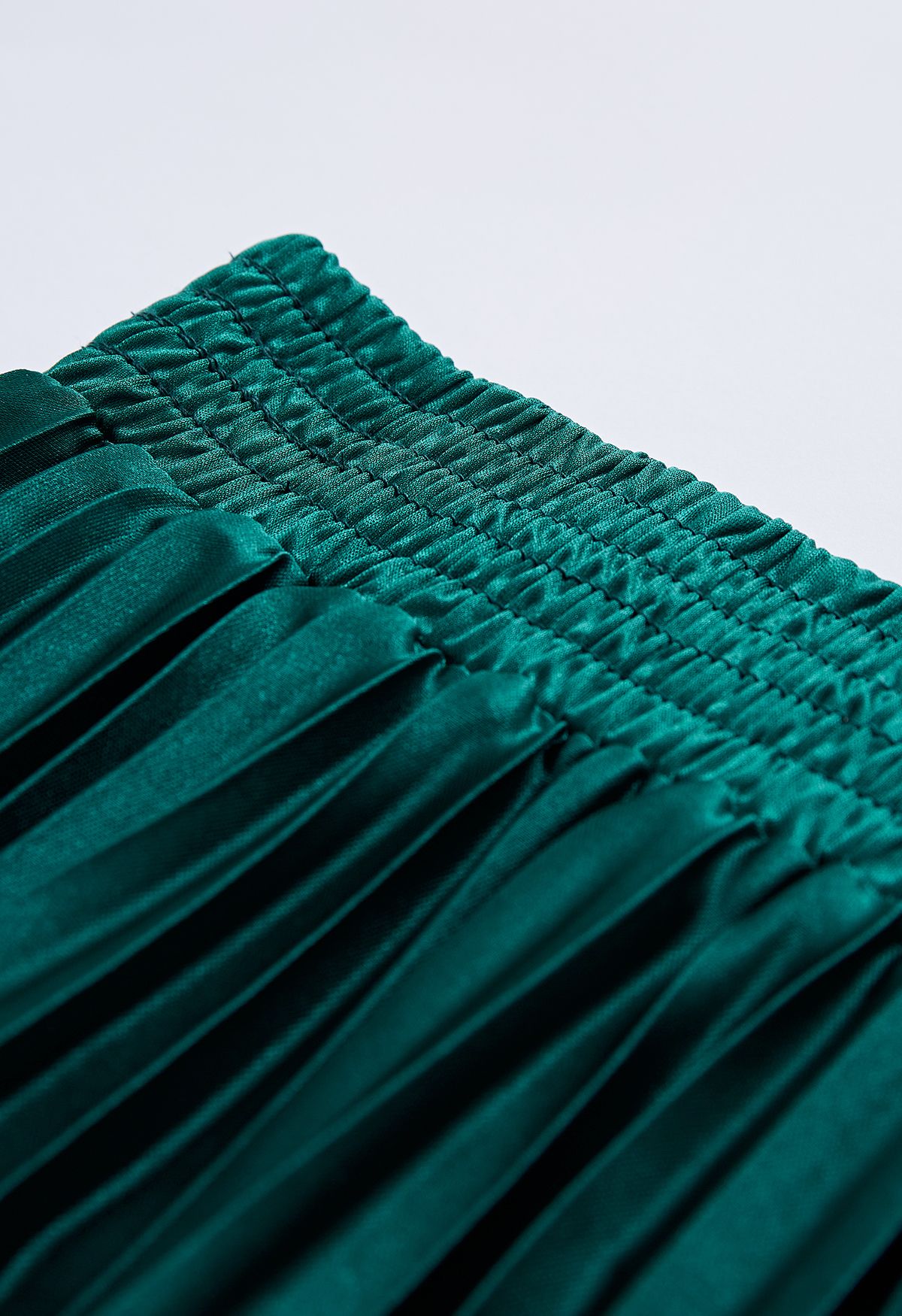 Falda larga plisada brillante en esmeralda