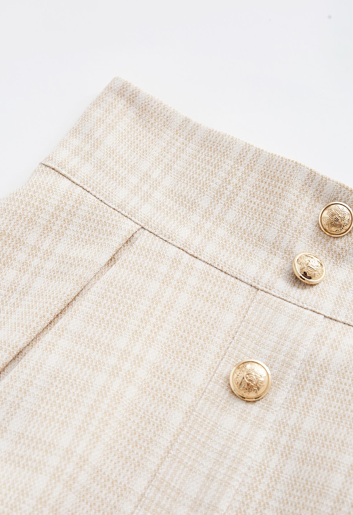 Falda midi plisada con ribete de botones de tweed a cuadros en albaricoque