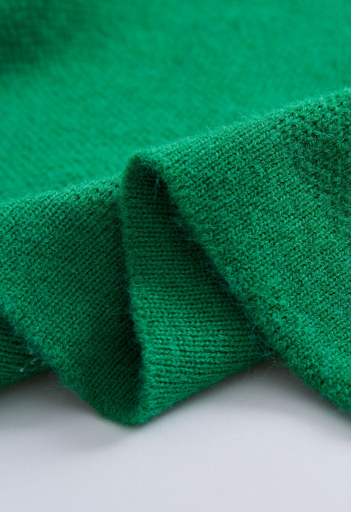 Cárdigan con doble botonadura en color de contraste en verde