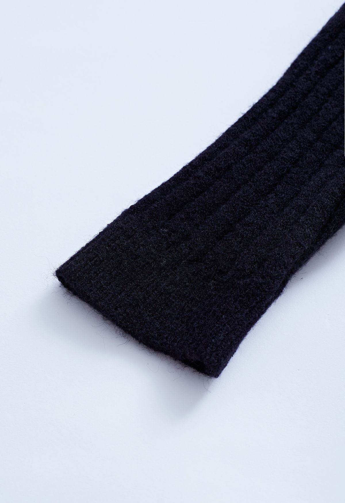 Suéter de punto con mangas de cuello alto en negro