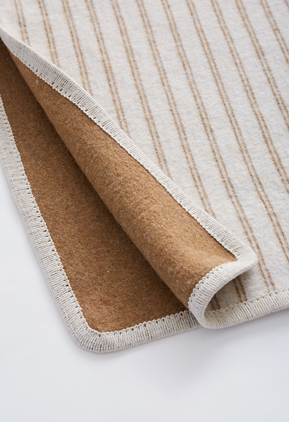 Poncho de piel sintética de mezcla de lana con rayas verticales