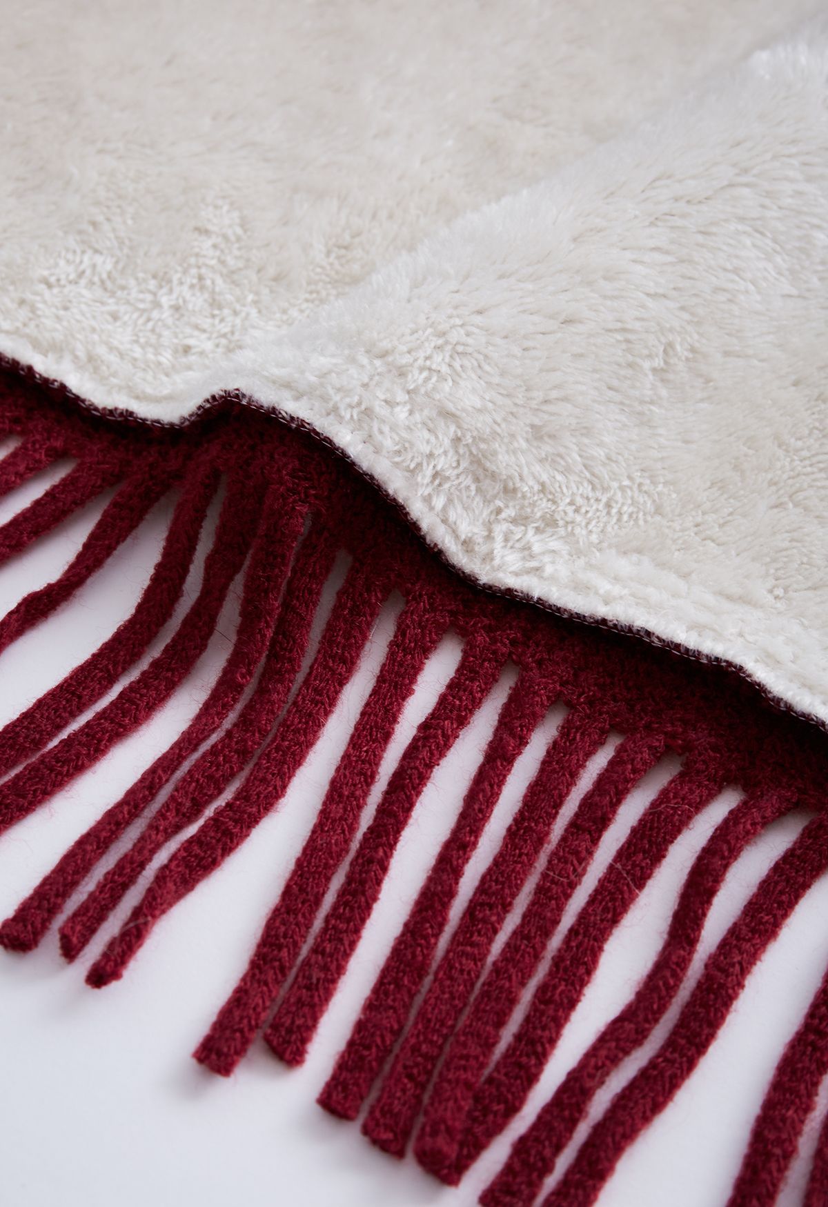 Poncho Snowflake de mezcla de lana con flecos y piel sintética con capucha