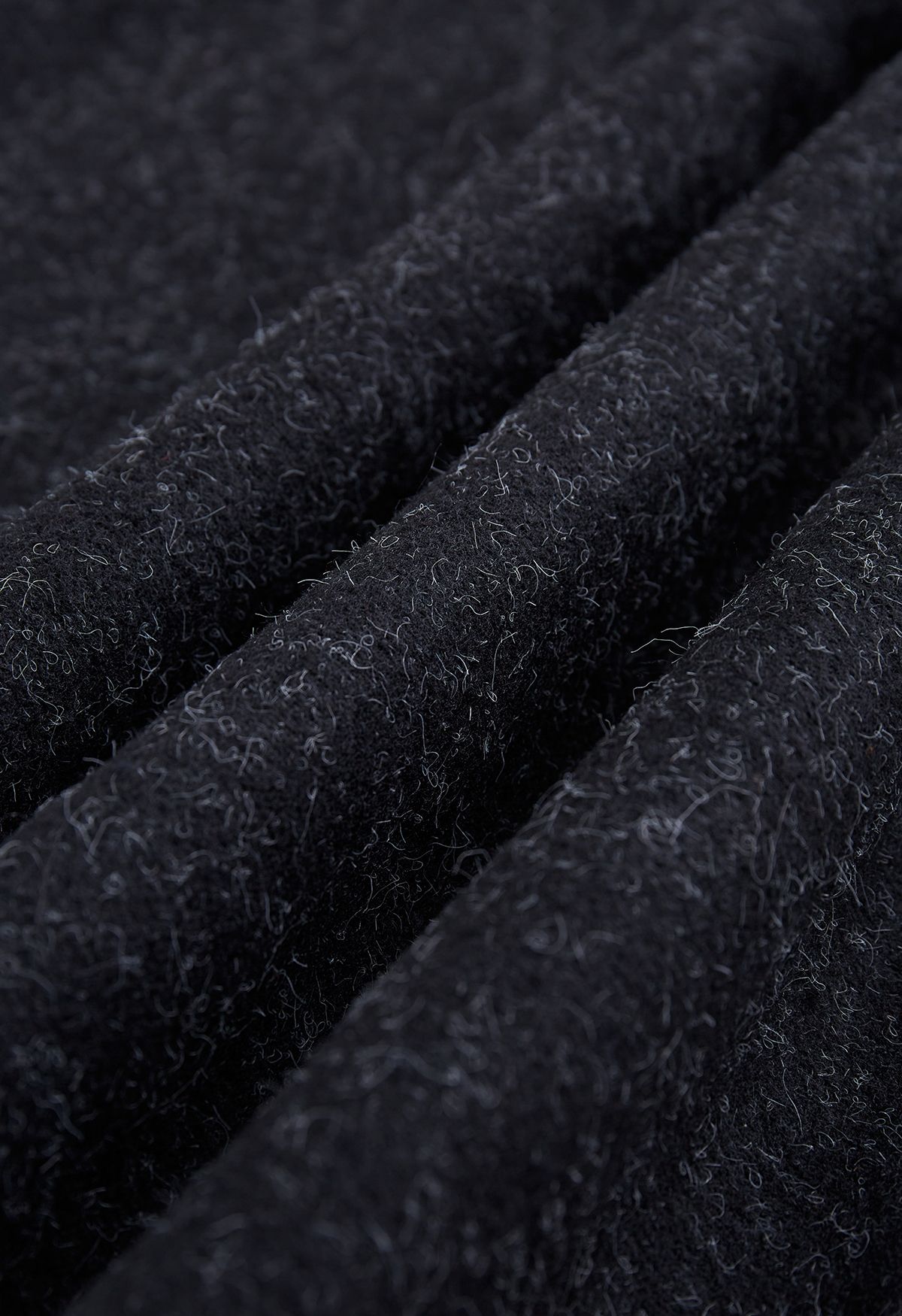 Poncho con capucha de piel sintética en mezcla de lana en negro