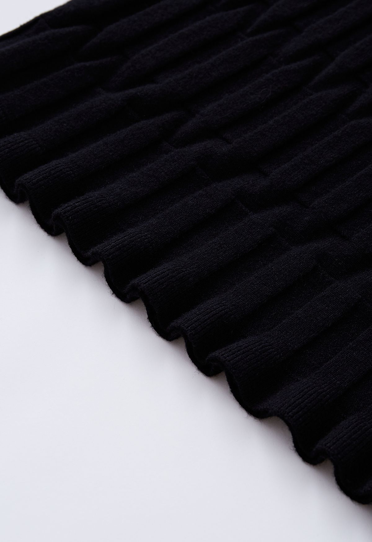 Falda lápiz de punto con textura en relieve en negro