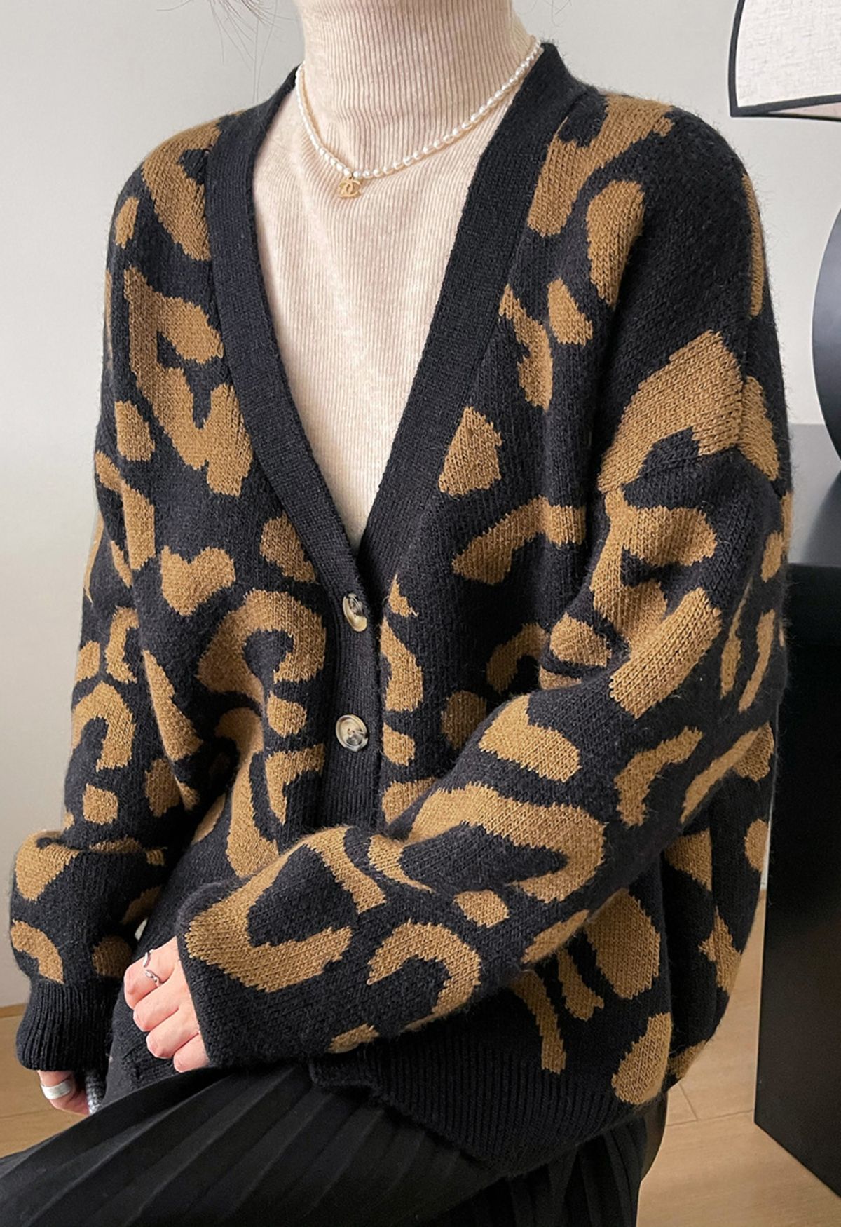 Cárdigan de punto con botones y estampado de leopardo