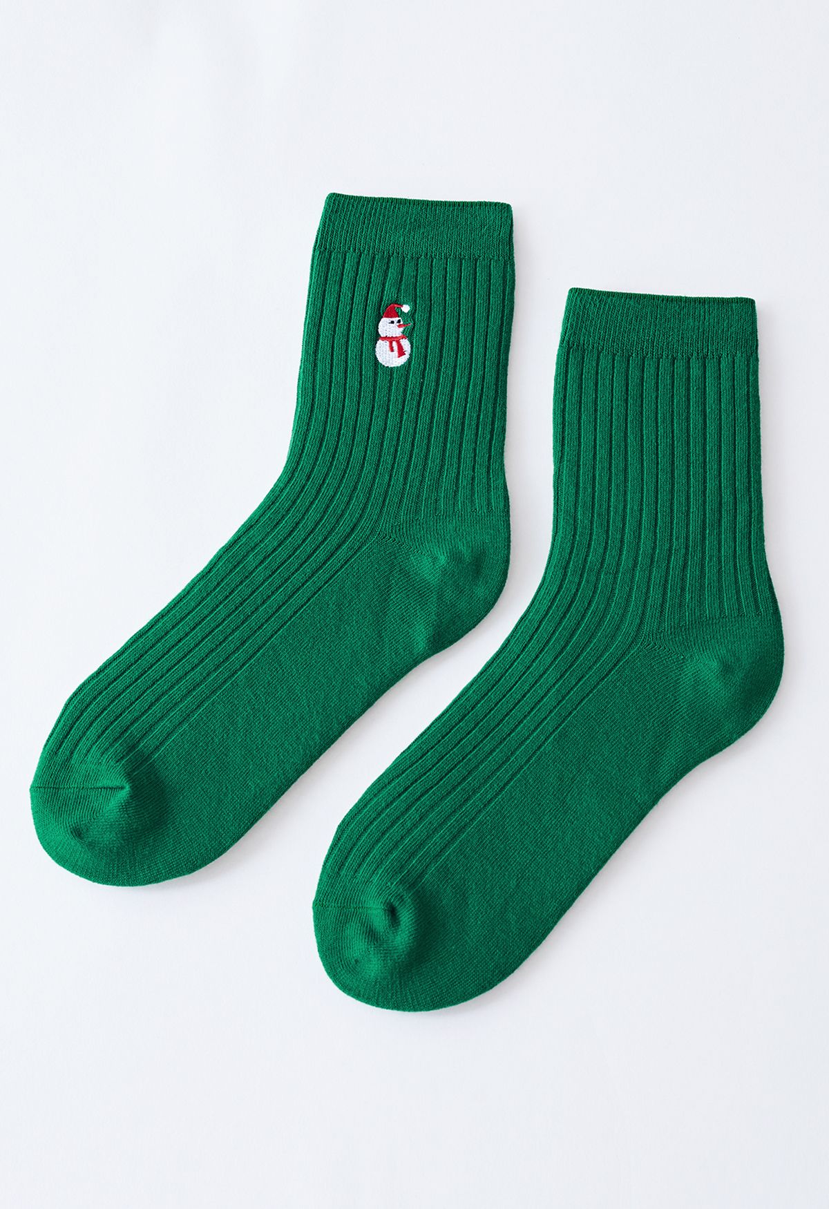 Caja de regalo con calcetines bordados de Papá Noel