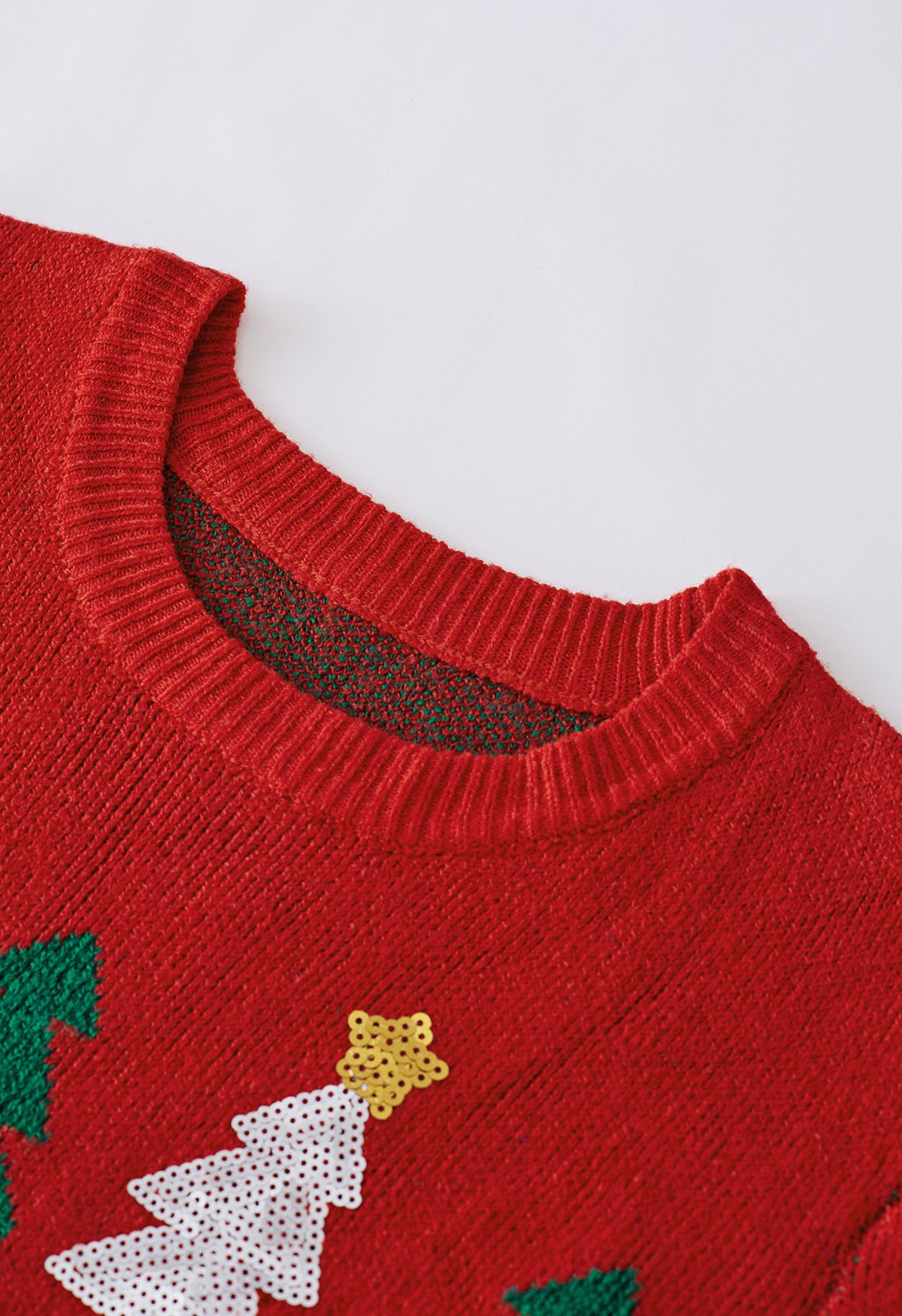 Suéter de punto de árbol de Navidad con lentejuelas en rojo