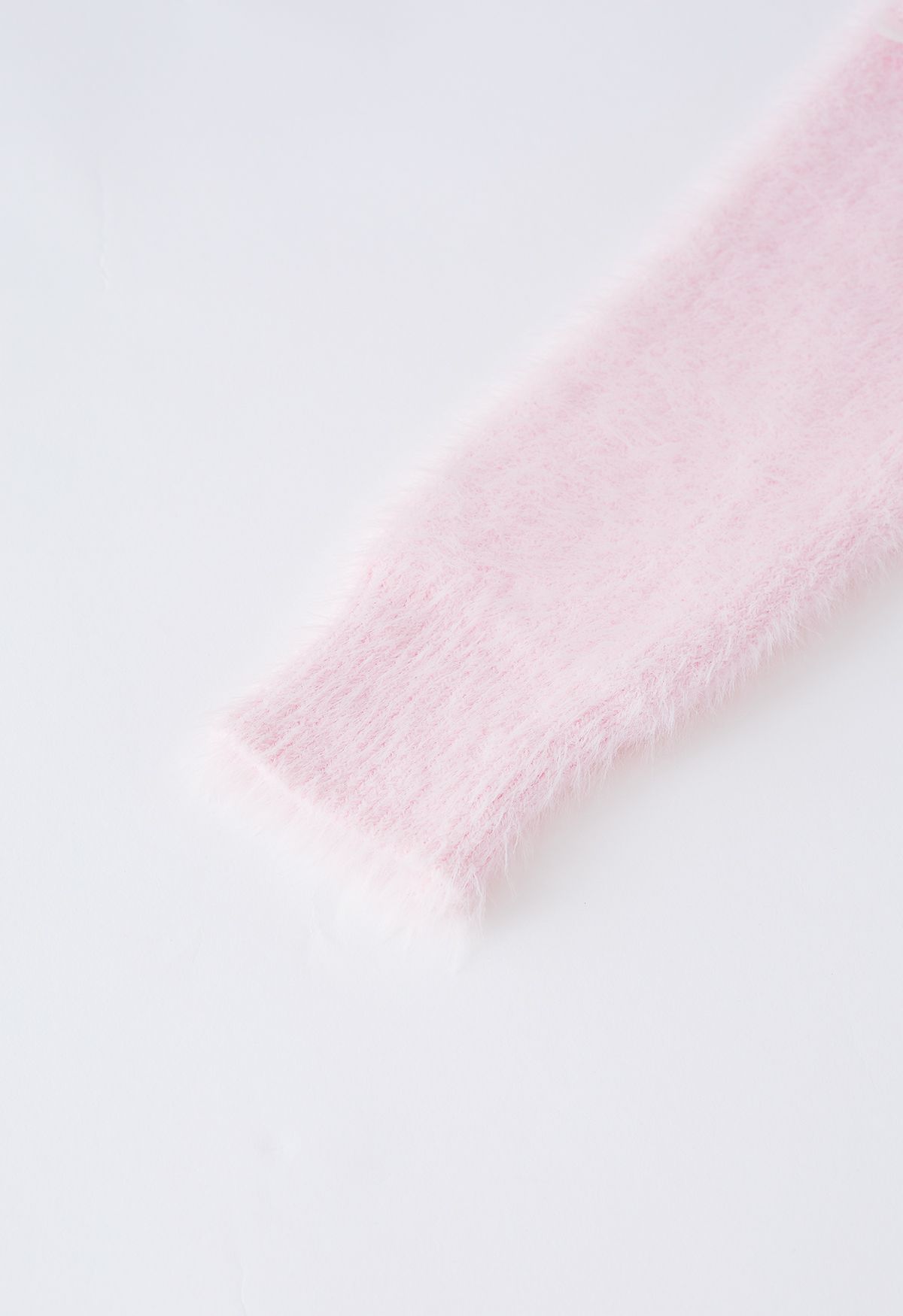 Cárdigan corto abotonado con lentejuelas y cuello en V esponjoso en rosa