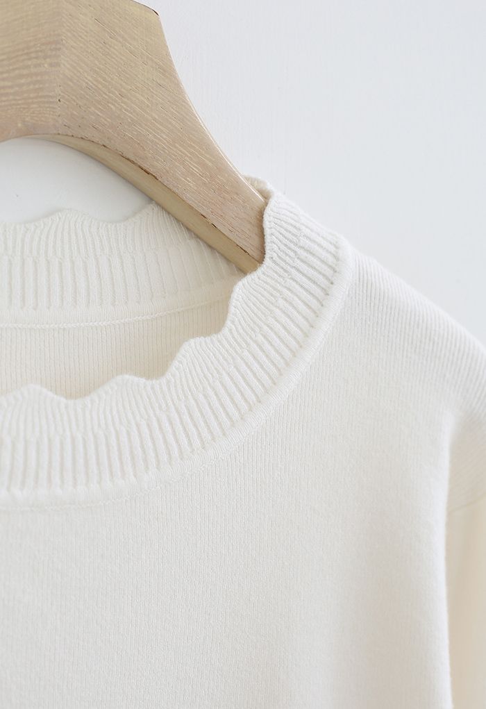 Suéter de canalé de punto suave fuzzy en crema