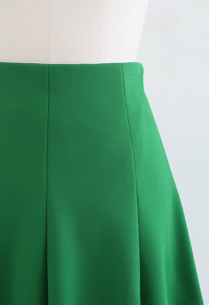 Minifalda acampanada con dobladillo sin rematar en verde