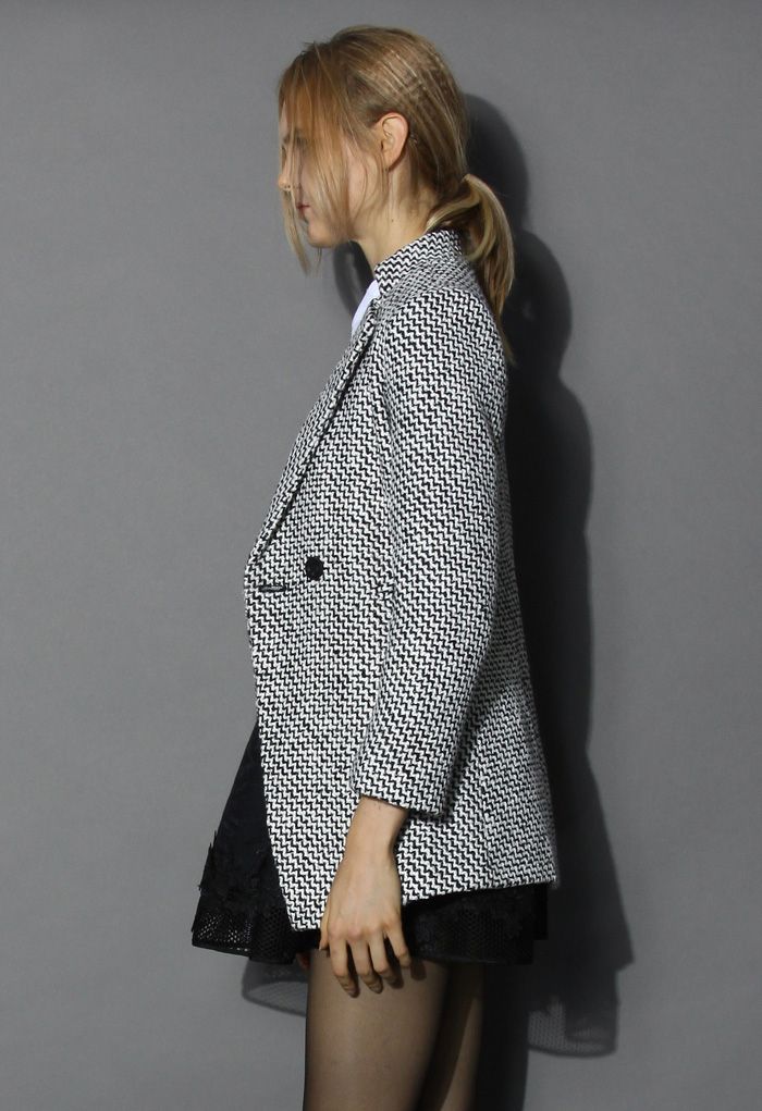 Elegante abrigo de tweed de doble botonadura