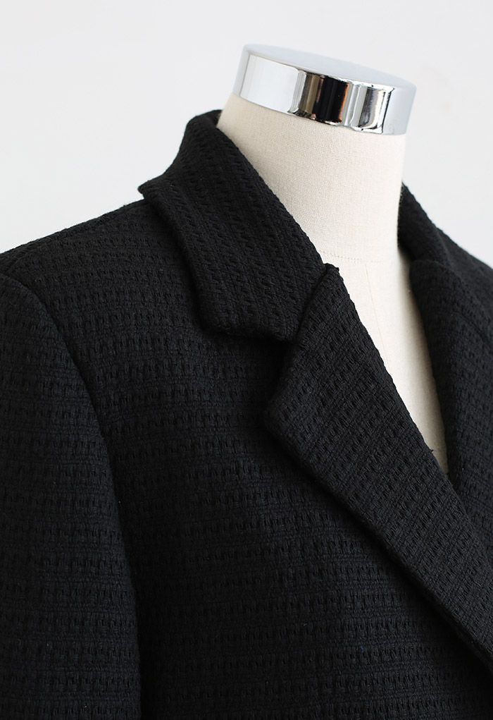 Blazer corto de tweed con botones característicos