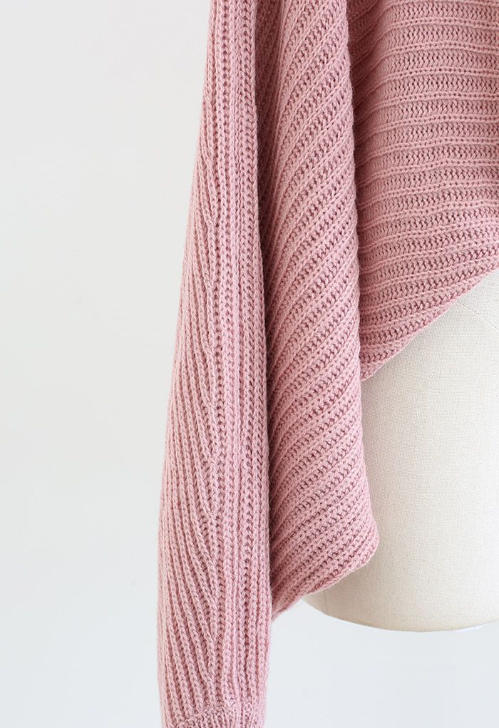 Suéter de punto con manga de murciélago en la parte delantera torcida en rosa