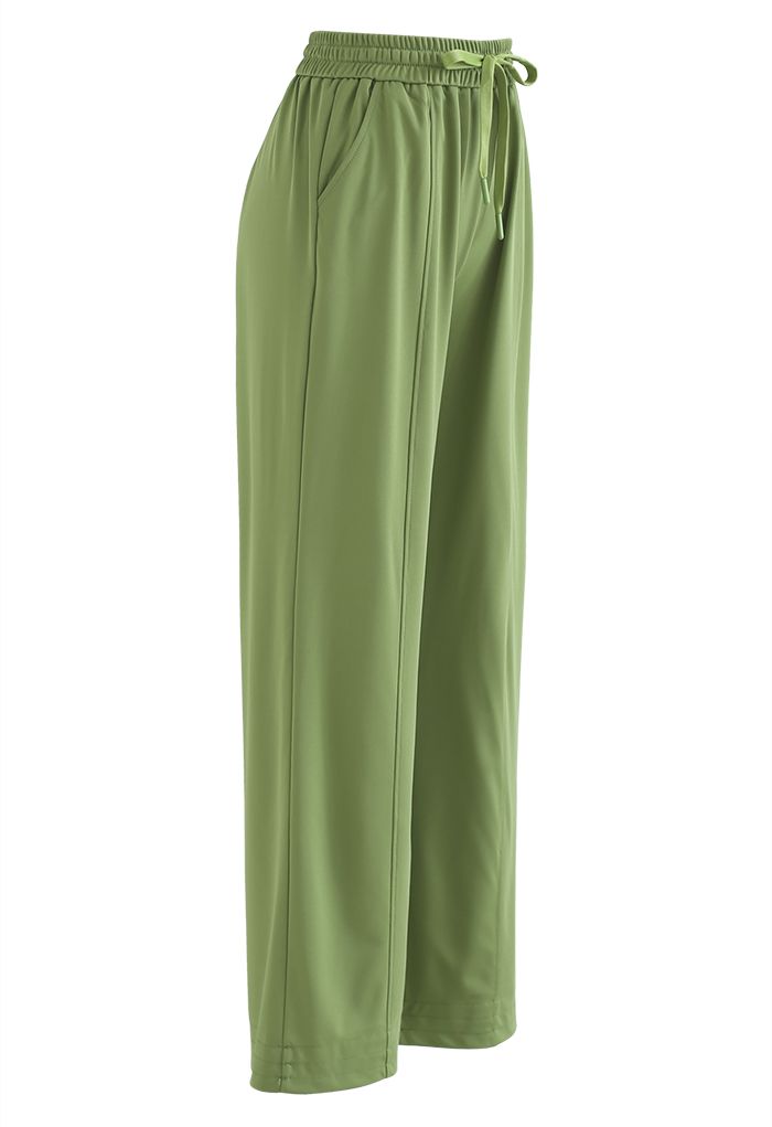 Pantalones casuales de pierna ancha con bolsillo lateral en verde