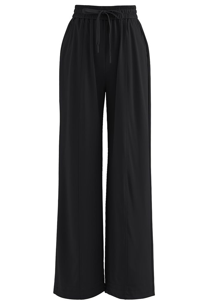 Pantalones casuales de pierna ancha con bolsillo lateral en negro