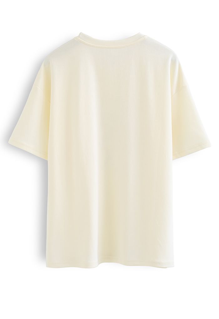 Camiseta con osito de cuentas en amarillo claro