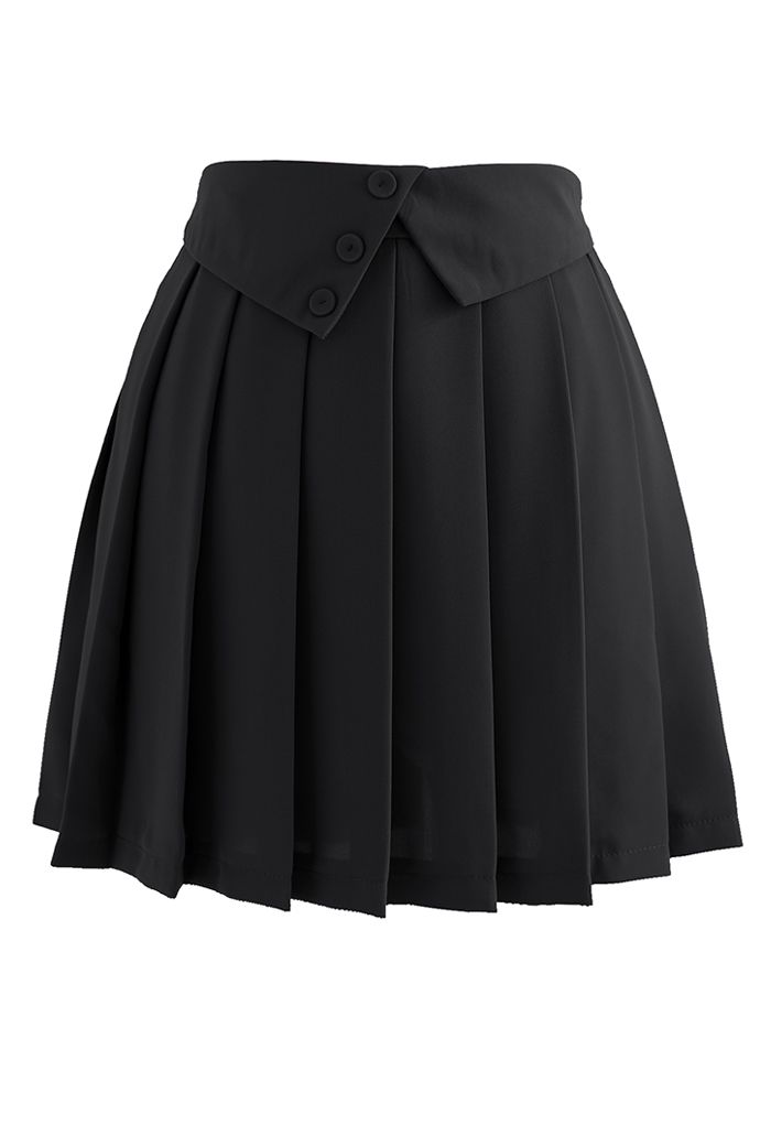 Minifalda plisada con cintura doblada y botones en negro