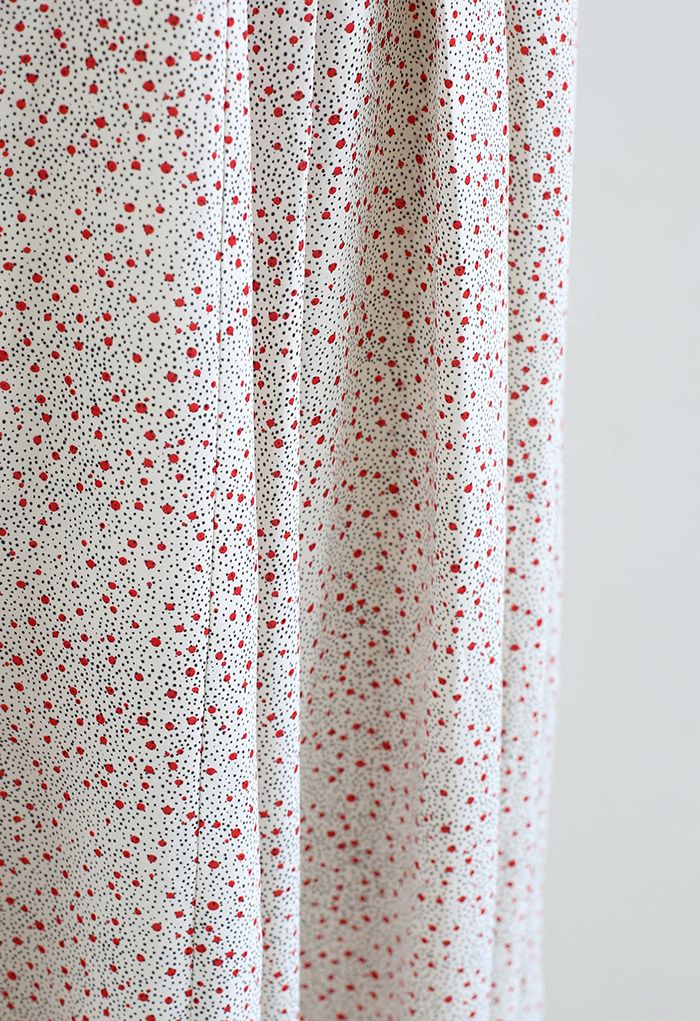 Falda larga plisada con estampado de lunares ditsy en marfil
