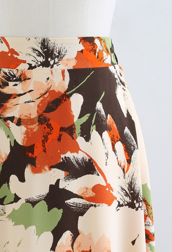 Falda midi con estampado floral abstracto en naranja