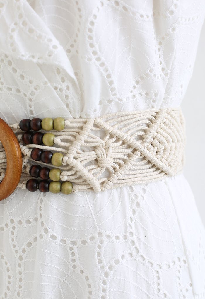 Cinturón tejido con hebilla de madera y decoración de cuentas en marfil