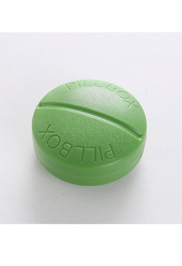 Caja de medicación portátil en forma de píldora