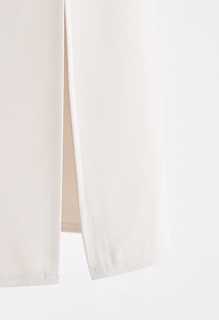 Falda de tubo con abertura en la cintura anudada con borde de cristal en marfil