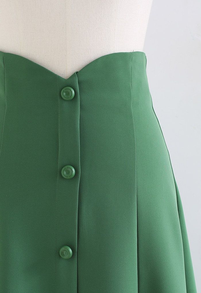 Falda midi acampanada de cintura alta con ribete de botones en verde