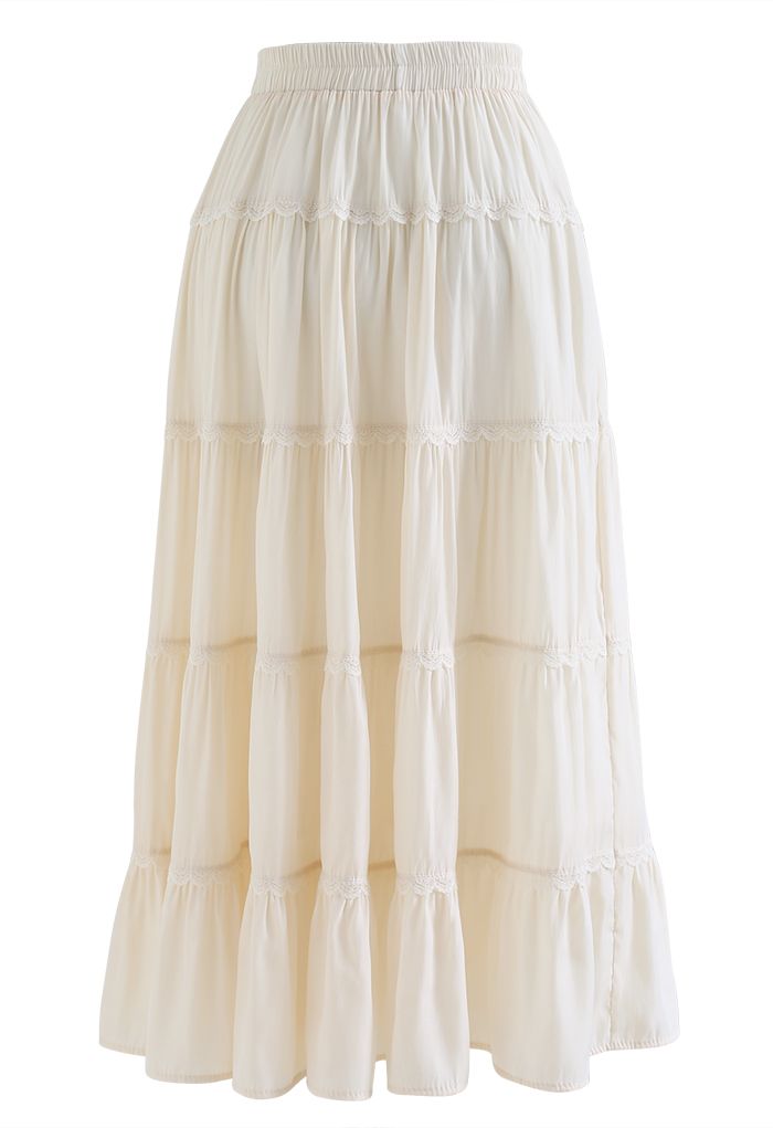 Falda midi plisada con volantes y encaje festoneado en color crema