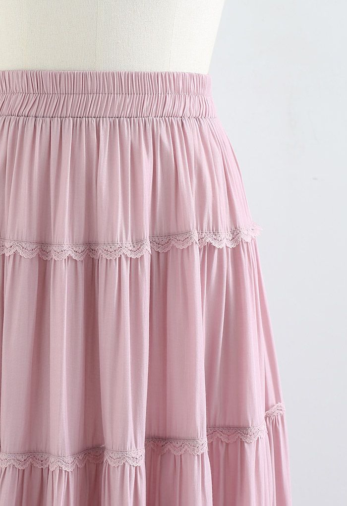 Falda midi plisada con volantes y encaje festoneado en rosa