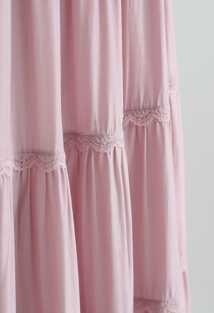 Falda midi plisada con volantes y encaje festoneado en rosa