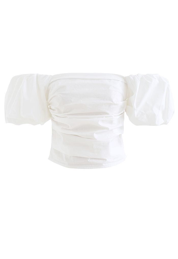 Top corto de algodón con hombros descubiertos y manga farol en blanco