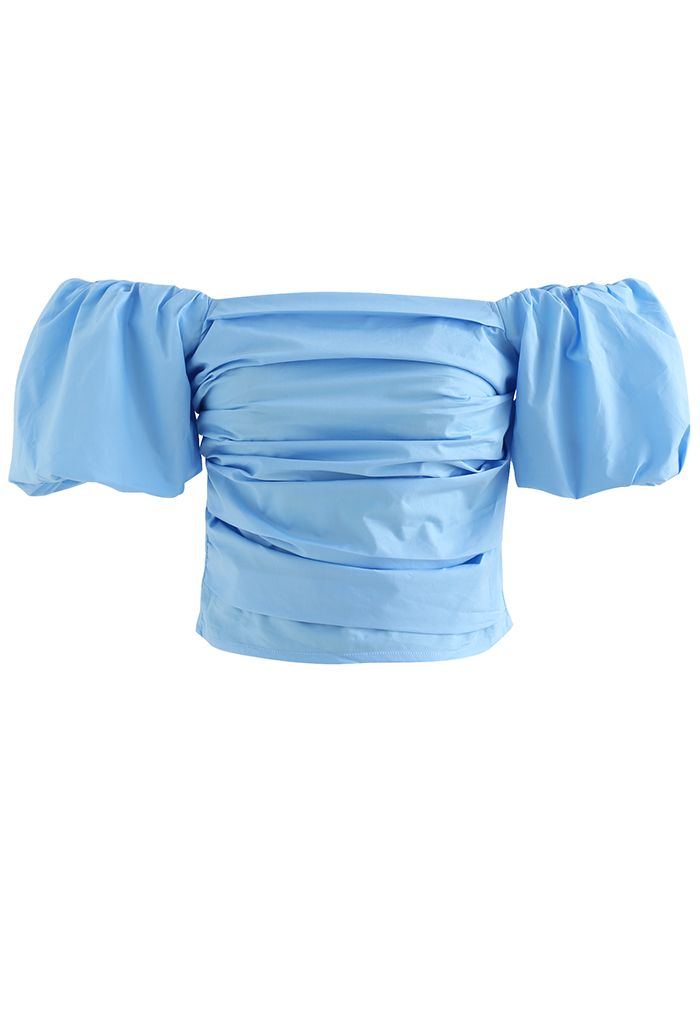 Top corto de algodón con hombros descubiertos y manga farol en azul