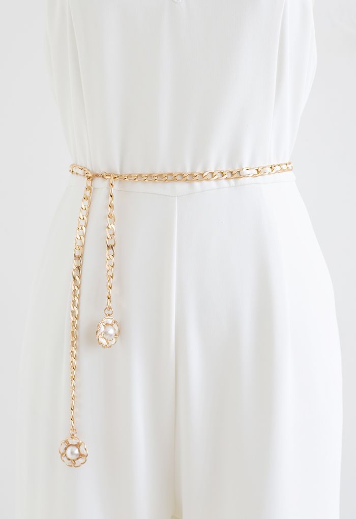 Cinturón con cadena dorada de piel sintética con perlas florales en marfil