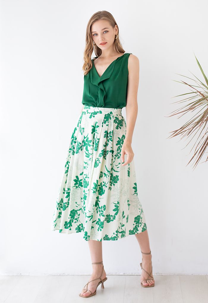 Falda midi de algodón con bolsillo lateral floral verde