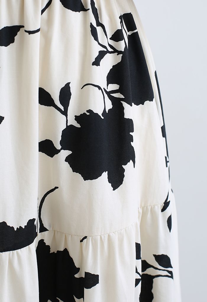 Conjunto de falda y top corto floral con hombros descubiertos en negro