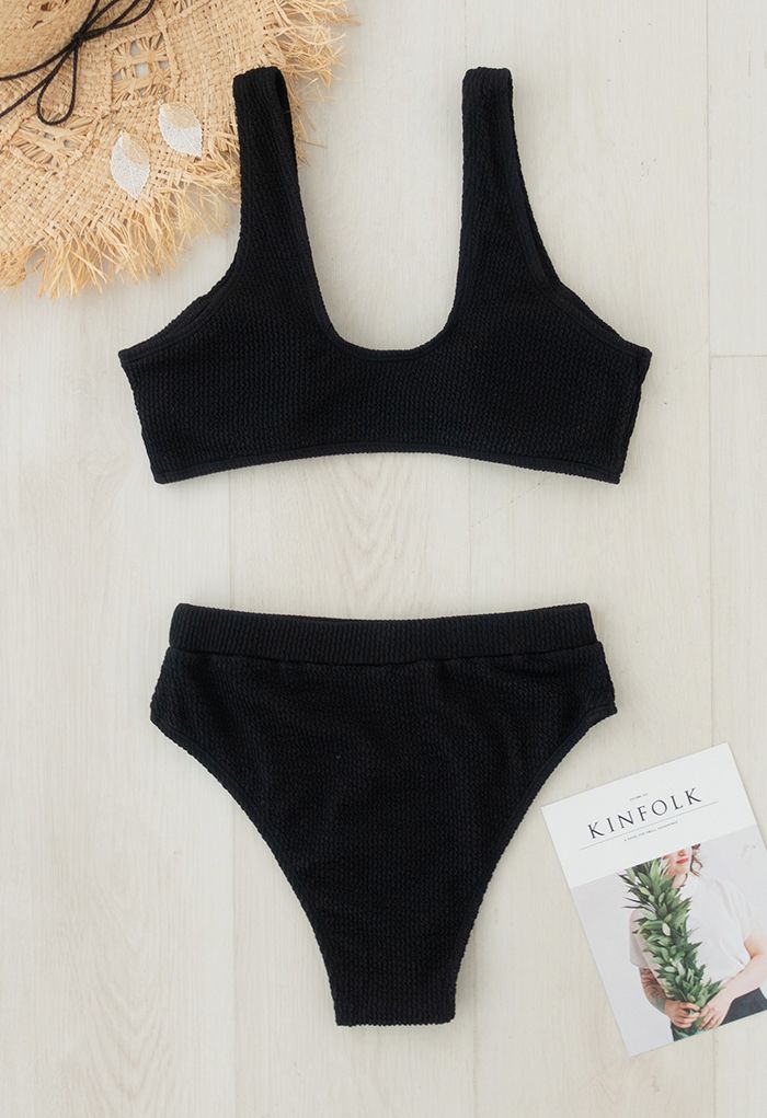 Conjunto de bikini negro texturizado con cierre frontal